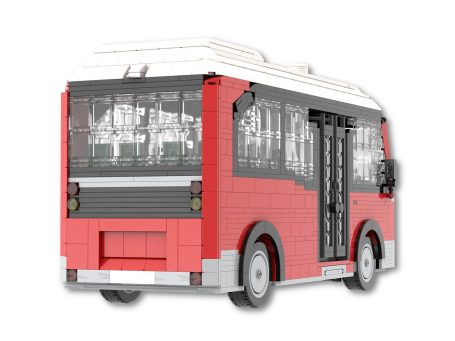 Autobús de juguete de bloques de construcción en colores rojo, blanco y negro.