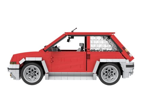 Coche compacto de juguete en color rojo, construido con bloques de Lego.