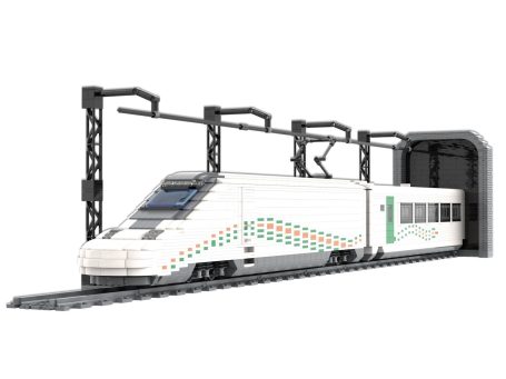 Tren de alta velocidad blanco con detalles verdes, estacionado en un túnel.