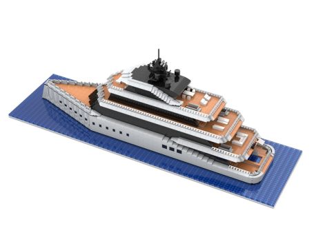 Yate moderno de lujo con varios niveles y detalles en la cubierta.