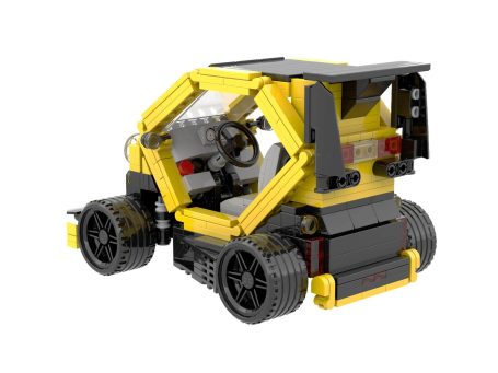 Coche de juguete construido con piezas de Lego, en colores amarillo y negro.