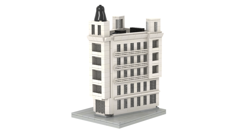 Edificio de varios pisos con tejado negro y detalles arquitectónicos en blanco.