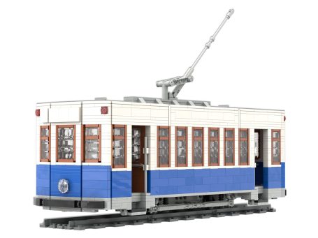 Tram Charleroi II de 1972 en colores azul y blanco con detalles en madera y un pantógrafo arriba.