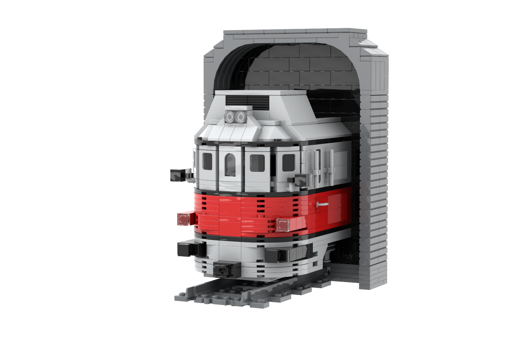 Modelo de tren de juguete en un túnel, con detalles en rojo y gris.