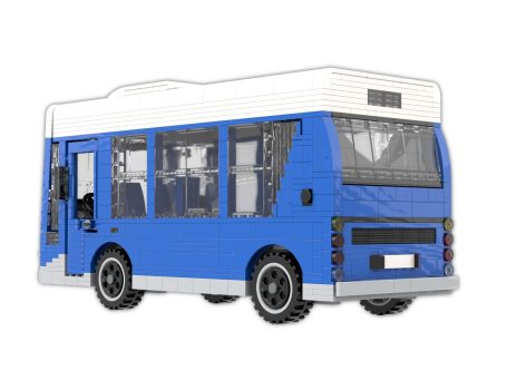 Autobús azul con ventanas grandes y una parte trasera blanca.