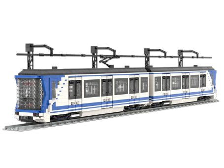 Tren CAF Serie 2000B Metro de Madrid de diseño moderno en colores blanco y azul, sobre rieles.