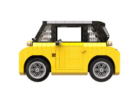 Coche de juguete LEGO amarillo con techo negro y ruedas grises.