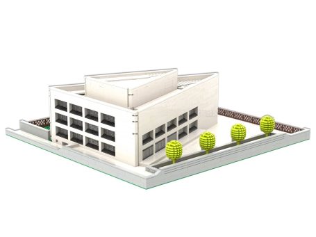 Edificio moderno con estructura triangular y árboles alrededor.